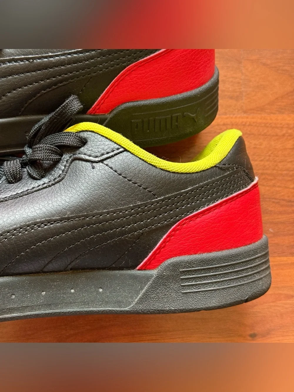 Puma Caracal sneakers men's size 7.5 women's size 9 black high-risk red nrgy